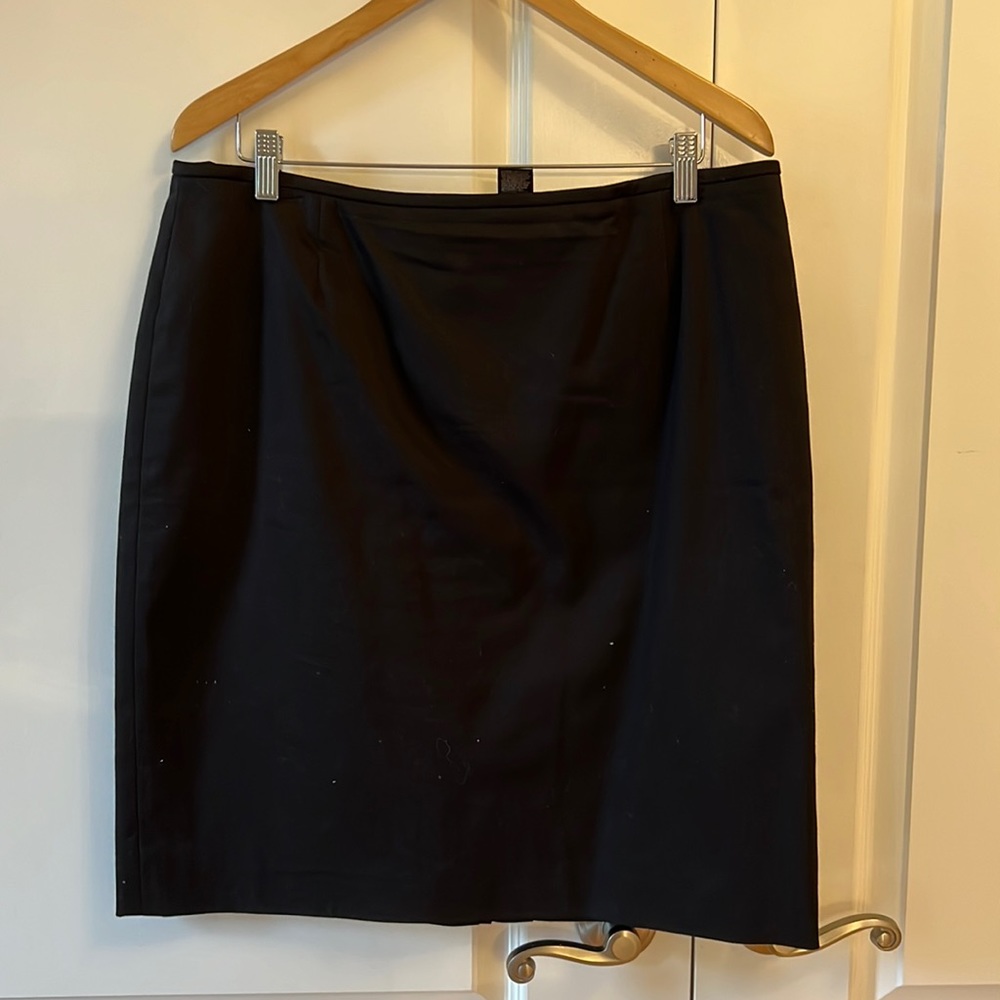 Simple black skirt with pleated back